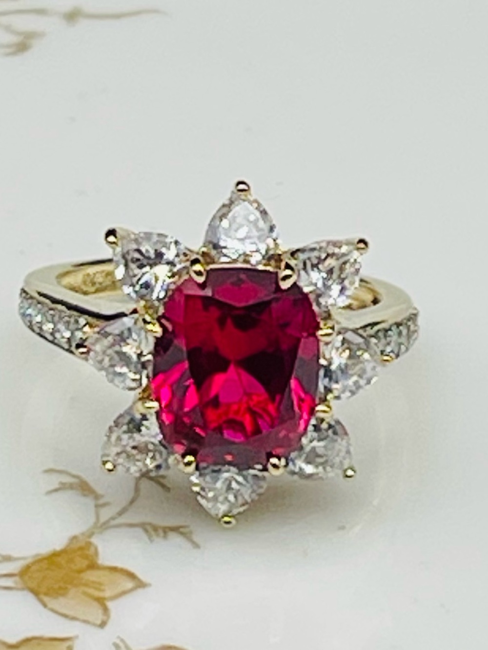 Nib Jean Dousset sim ruby 9mm center stone 
.925 SS with yellow gold sz 8